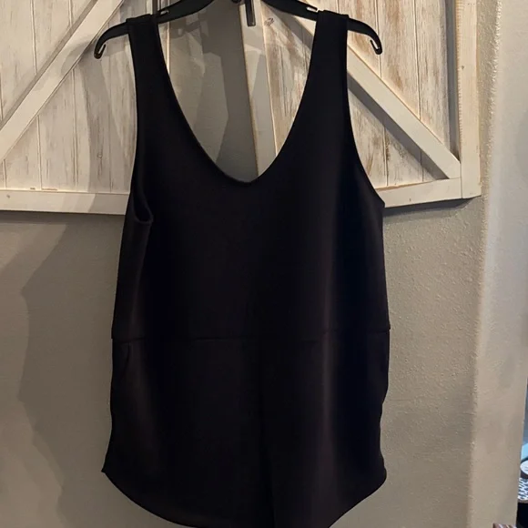 A new day Black Sleeveless Jumpsuit with pockets nwot ptp 22 with stretch - Picture 2 of 4